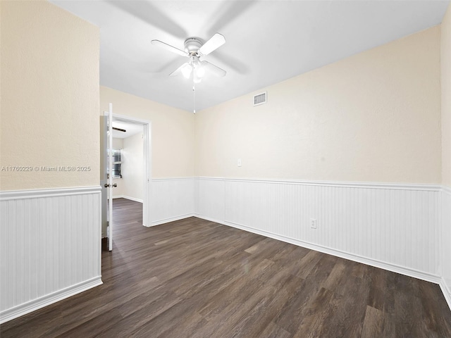 1311 N 19th Ave, Hollywood, FL 33020 - spare room featuring ceiling fan, wainscoting, and wood finished floors