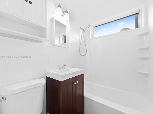 1311 N 19th Ave, Hollywood, FL 33020 - bathroom with toilet, tile walls, bathtub / shower combination, vanity, and decorative backsplash
