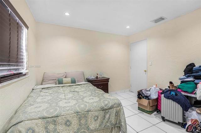 bedroom featuring light tile patterned floors, recessed lighting, and visible vents