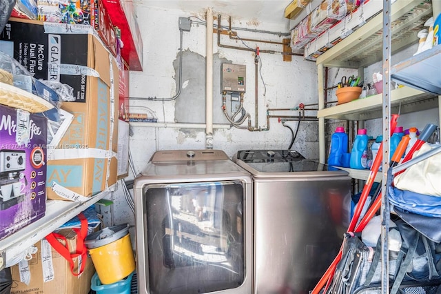 washroom featuring independent washer and dryer and laundry area