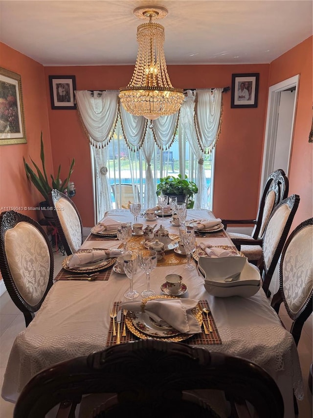 dining space featuring an inviting chandelier