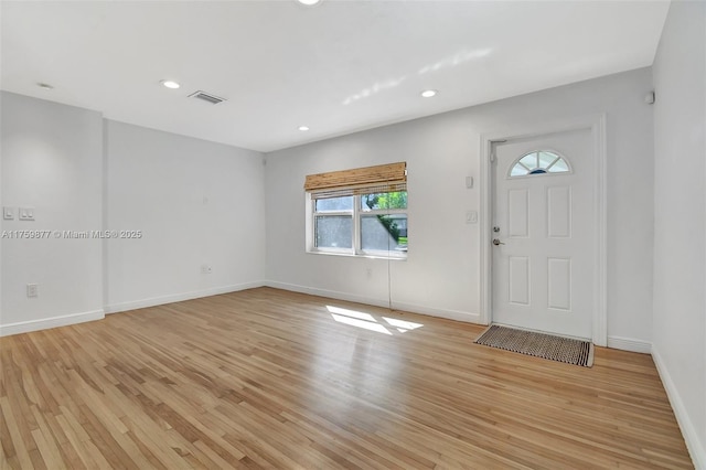 entrance foyer featuring recessed lighting, visible vents, baseboards, and light wood-style flooring