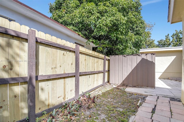 view of yard featuring a patio area and fence