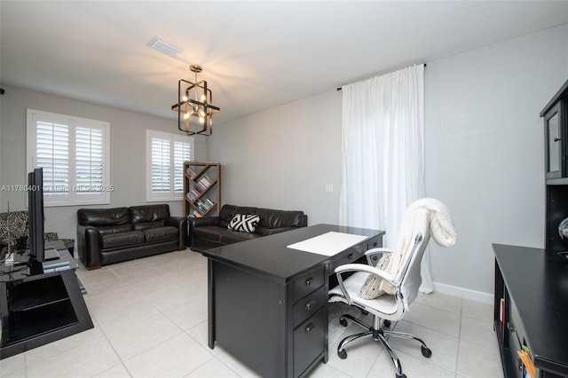 office space featuring an inviting chandelier, light tile patterned floors, baseboards, and visible vents