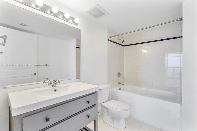 full bath with visible vents, toilet, vanity, and tile patterned flooring