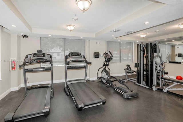 3590 Coral Way Unit 910, Miami, FL 33145 - exercise room with recessed lighting, baseboards, visible vents, and a raised ceiling