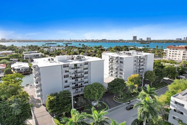 bird's eye view featuring a city view and a water view