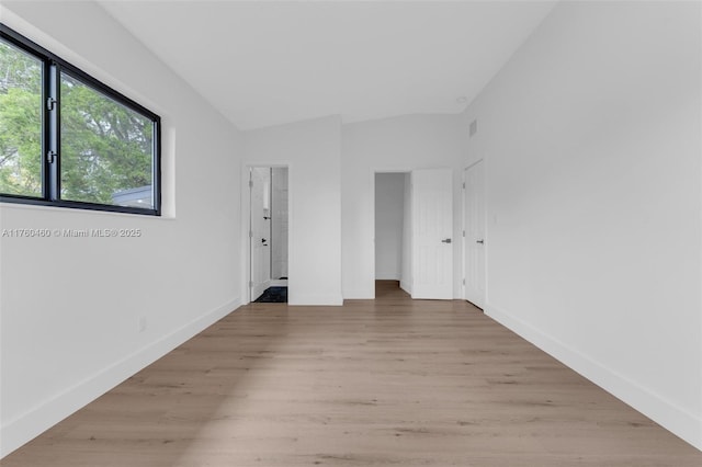 531 NE 175th Ter, North Miami Beach, FL 33162 - unfurnished room featuring light wood finished floors and baseboards
