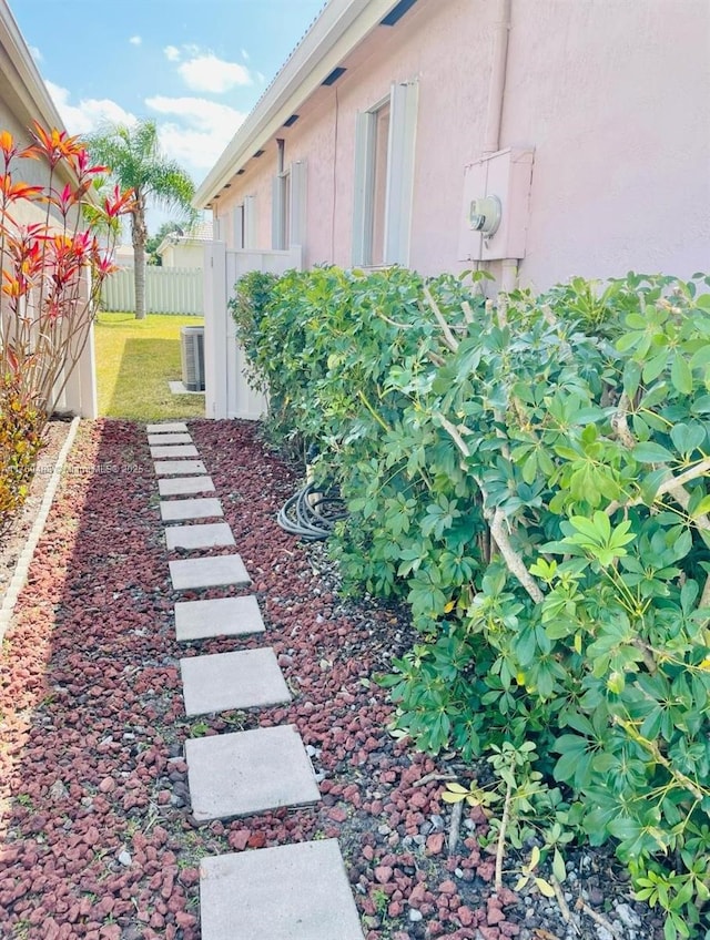 6938 NW 33rd St, Margate, FL 33063 - view of yard featuring central AC