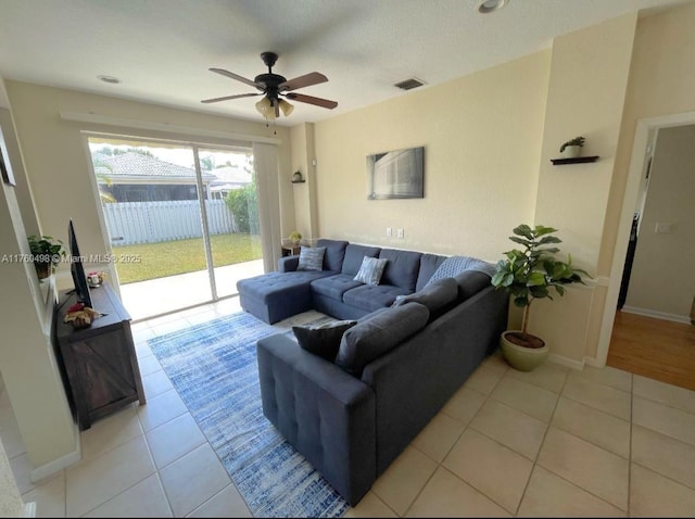 6938 NW 33rd St, Margate, FL 33063 - living room with light tile patterned floors and ceiling fan