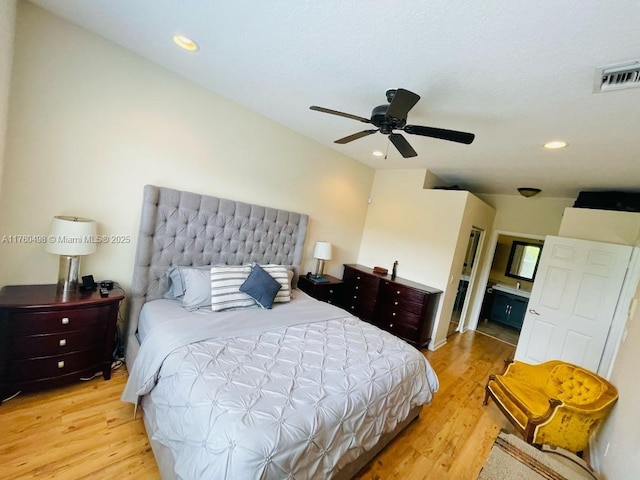 6938 NW 33rd St, Margate, FL 33063 - bedroom with light wood finished floors, recessed lighting, and a ceiling fan