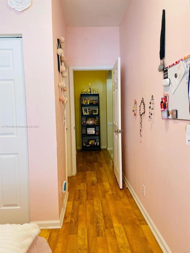6938 NW 33rd St, Margate, FL 33063 - hall featuring wood finished floors and baseboards