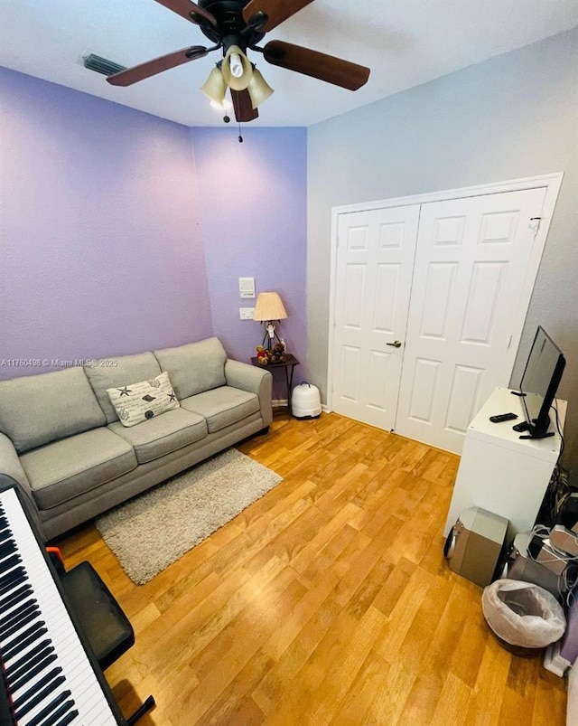 6938 NW 33rd St, Margate, FL 33063 - living room featuring a ceiling fan and light wood-style floors