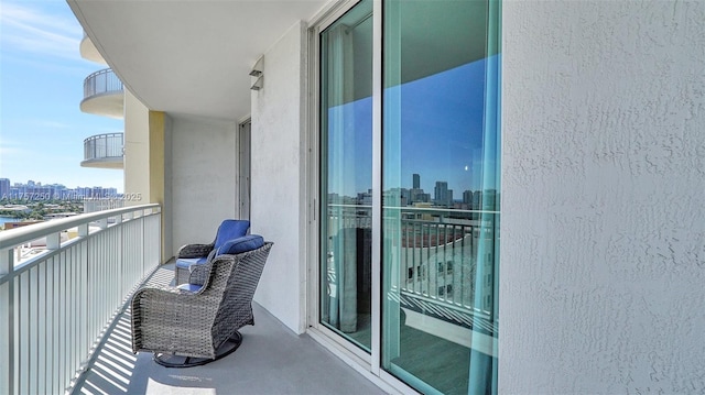 balcony featuring a view of city