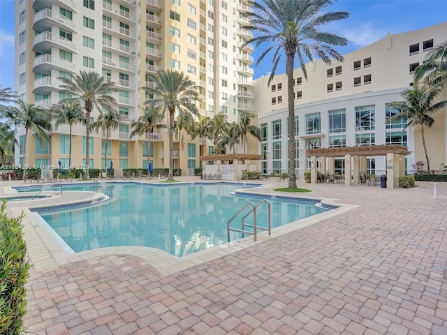 pool with a patio