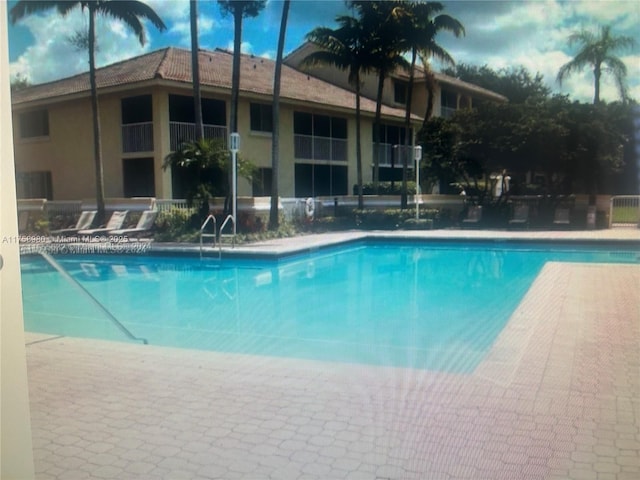 pool featuring fence