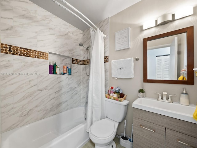 bathroom featuring shower / tub combo with curtain, vanity, and toilet