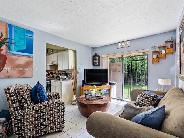 living room featuring a textured ceiling and light tile patterned flooring