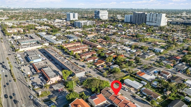 birds eye view of property with a view of city