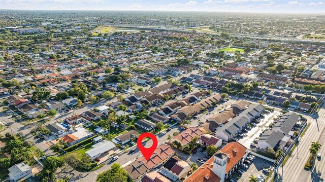 birds eye view of property with a residential view