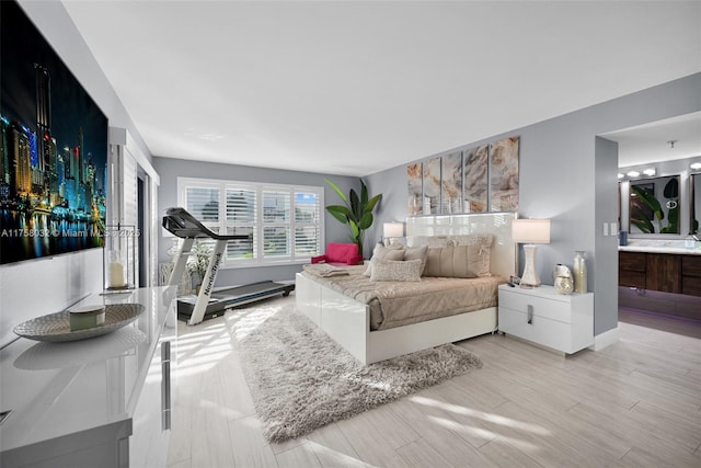 bedroom with light wood-style floors