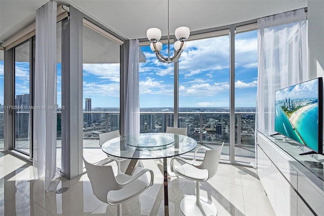 dining room with a chandelier, a city view, light tile patterned flooring, and a healthy amount of sunlight