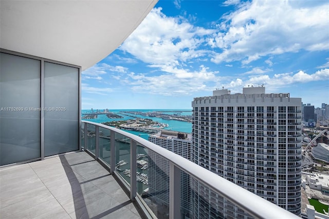 balcony with a city view and a water view