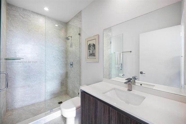 full bath featuring recessed lighting, a shower stall, toilet, and vanity