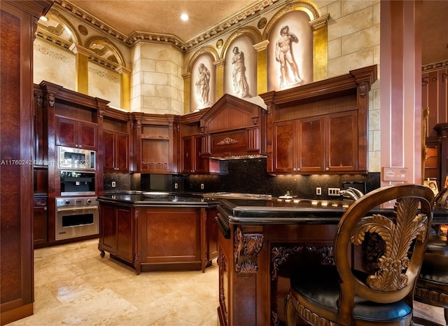 kitchen with dark countertops, open shelves, decorative backsplash, dark brown cabinets, and stainless steel microwave