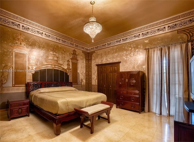 bedroom featuring a chandelier and wallpapered walls