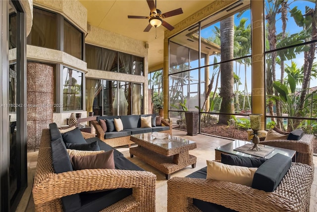 sunroom / solarium with ceiling fan