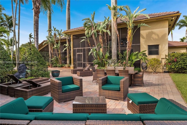 view of patio with an outdoor living space and outdoor dining area