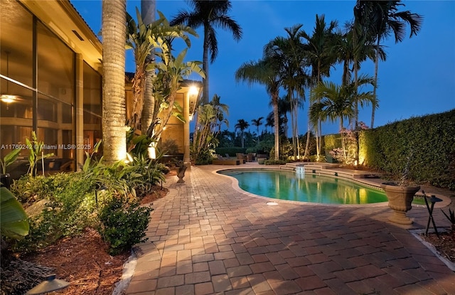 pool with a patio area