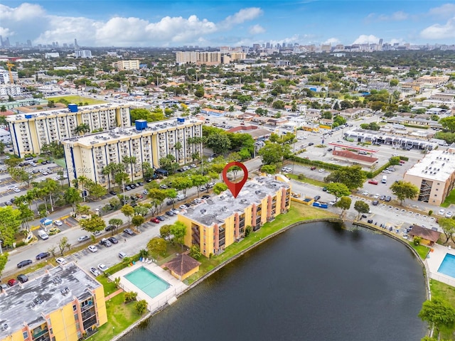 aerial view featuring a view of city and a water view