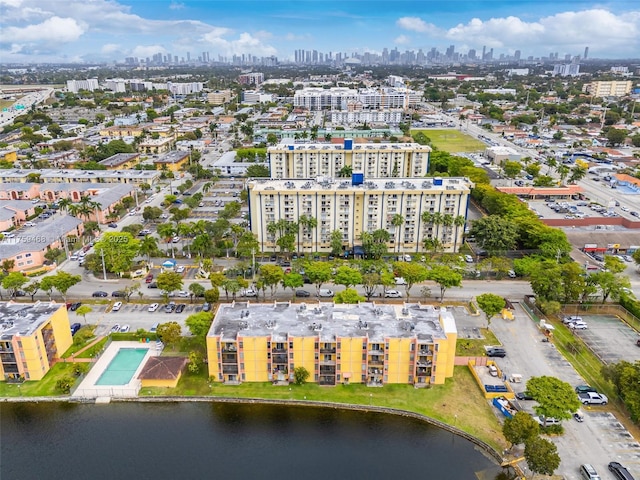 bird's eye view featuring a city view and a water view