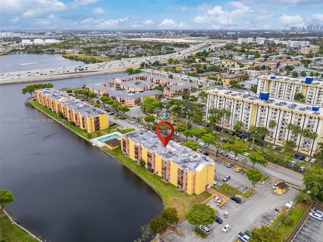 aerial view featuring a water view and a view of city