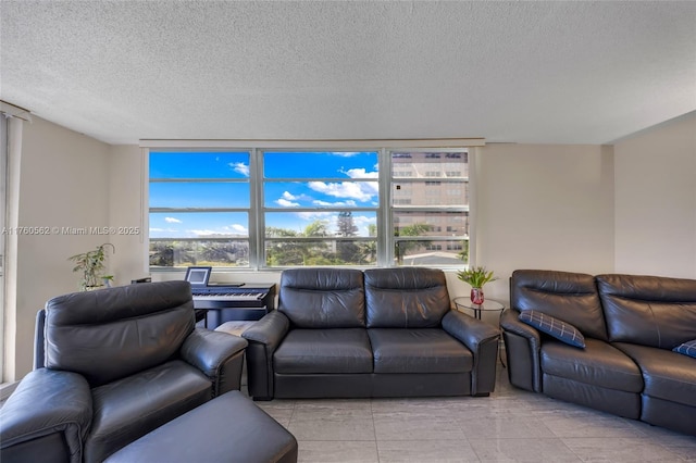 3113 S Ocean Dr Unit 506, Hallandale Beach, FL 33009 - living room featuring a textured ceiling