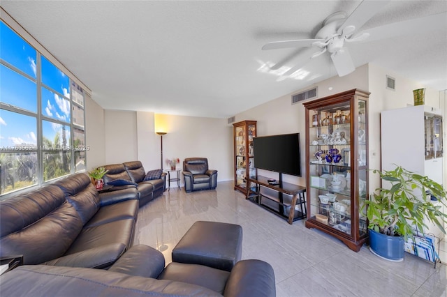 3113 S Ocean Dr Unit 506, Hallandale Beach, FL 33009 - living room featuring a wall of windows, a ceiling fan, and visible vents