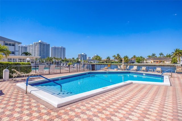 3113 S Ocean Dr Unit 506, Hallandale Beach, FL 33009 - pool with a city view, a patio, and fence