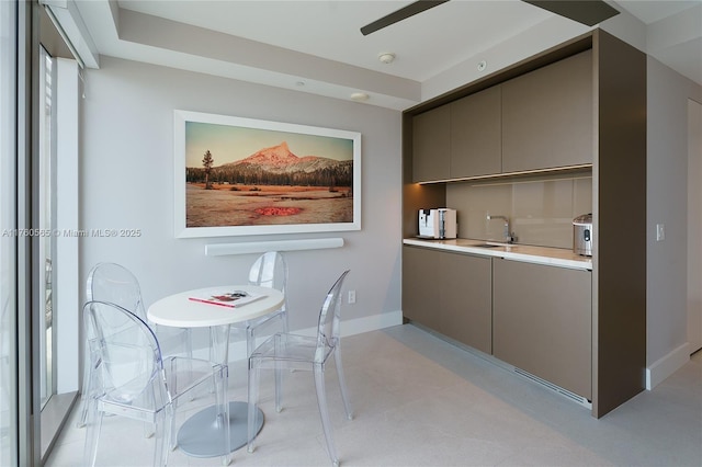 dining room featuring baseboards