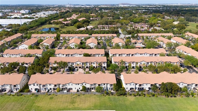 bird's eye view with a residential view and a water view