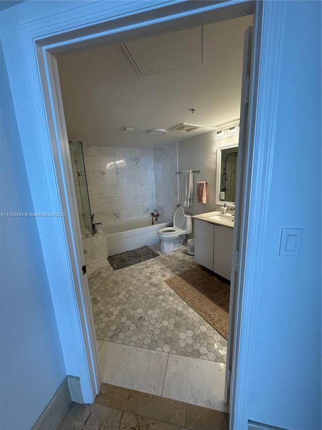 full bath featuring vanity, toilet, bathtub / shower combination, and tile patterned flooring