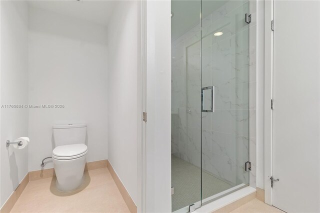16385 Biscayne Blvd Unit 1921, North Miami Beach, FL 33160 - bathroom featuring toilet and a marble finish shower