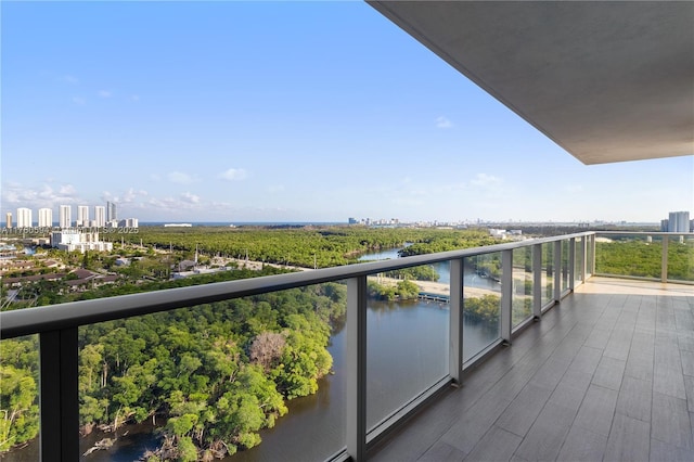 balcony with a city view and a water view