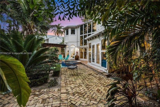 view of patio featuring french doors
