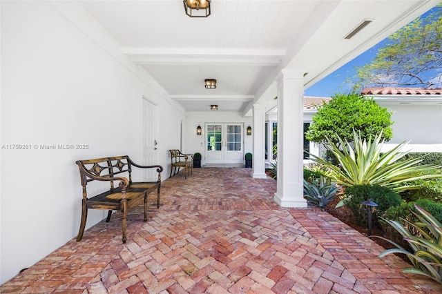 1117 Bella Vista Ave, Coral Gables, FL 33156 - entrance to property featuring french doors, a tile roof, and stucco siding