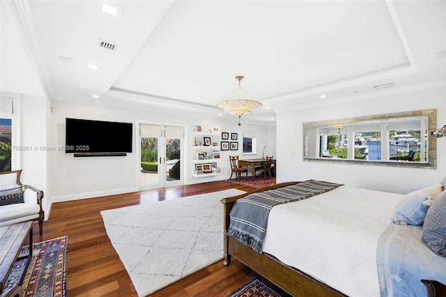 1117 Bella Vista Ave, Coral Gables, FL 33156 - bedroom with crown molding, wood finished floors, a tray ceiling, access to exterior, and visible vents