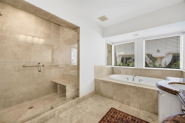1117 Bella Vista Ave, Coral Gables, FL 33156 - bathroom featuring a shower stall, a garden tub, vanity, and visible vents