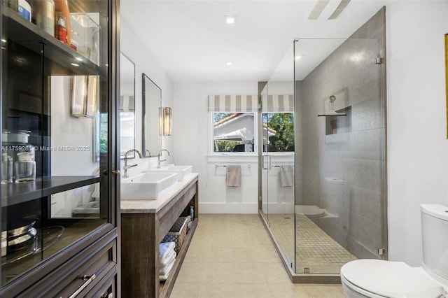 1117 Bella Vista Ave, Coral Gables, FL 33156 - full bath with double vanity, a shower stall, toilet, and a sink
