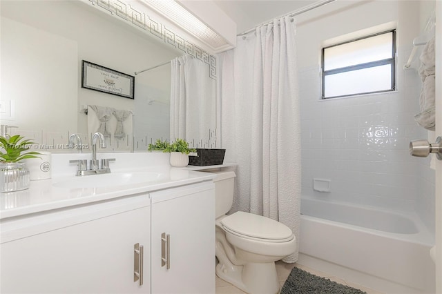 bathroom featuring tile patterned flooring, vanity, toilet, and shower / tub combo with curtain